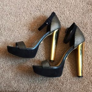 Bebe black and gold heels